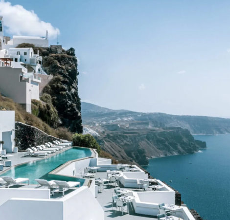 Luxury hotel pool overlooking Greek hillside